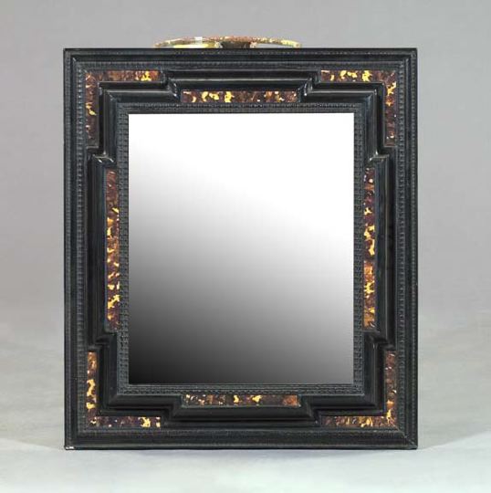 Appraisal: Dutch Ripple-Carved Ebonized and Tortoiseshell-Inlaid Looking Glass in the th-century