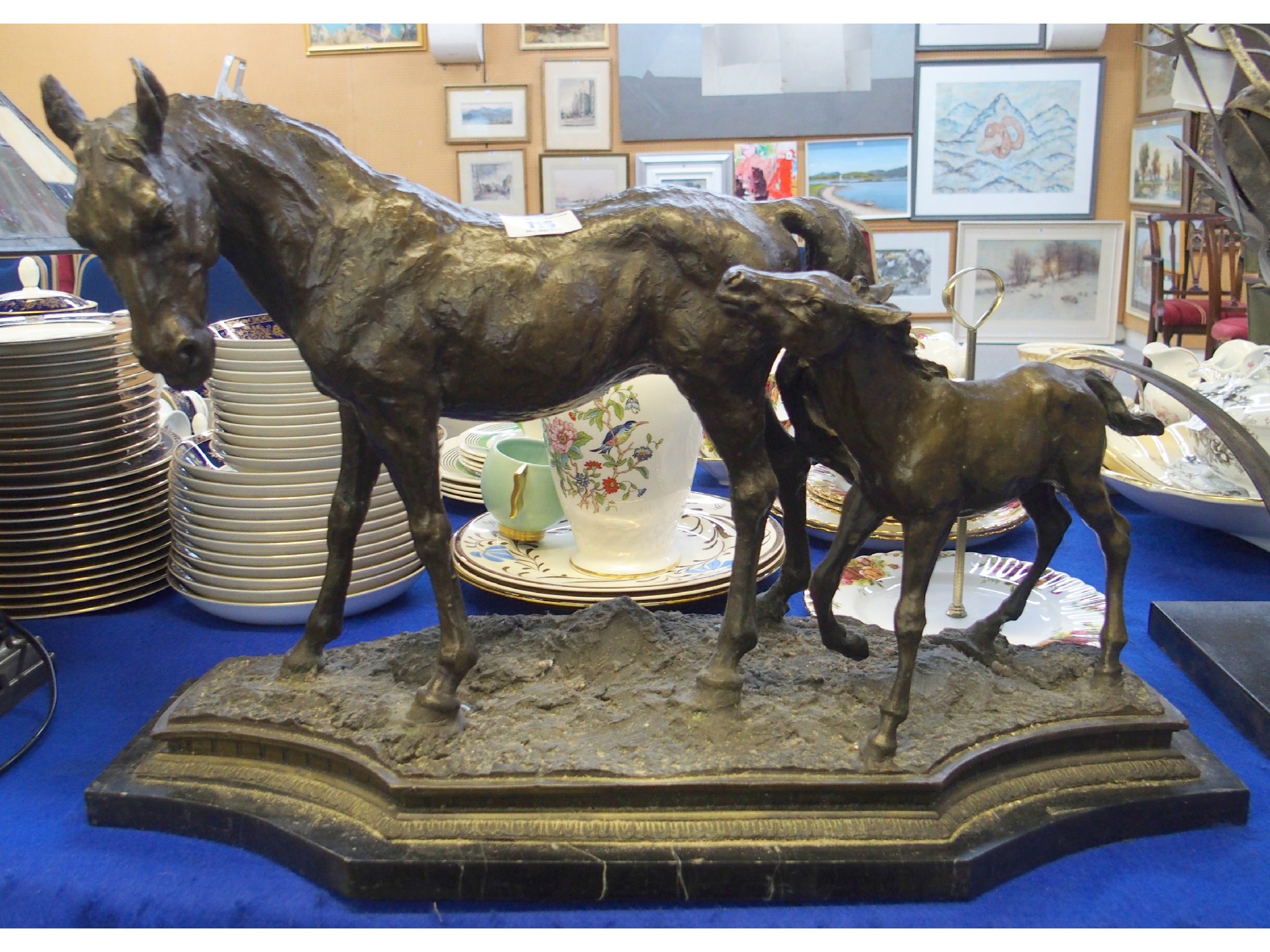 Appraisal: Bronzed resin model of a mare and foal