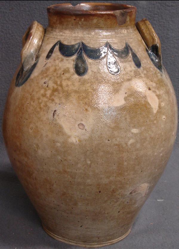 Appraisal: Ovoid stoneware jar with blue incised drapery decoration around rim