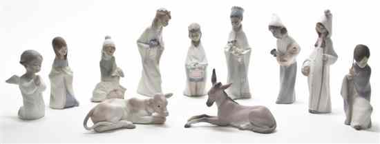 Appraisal: A Lladro Porcelain Partial Nativity Set comprising nine figures depicted