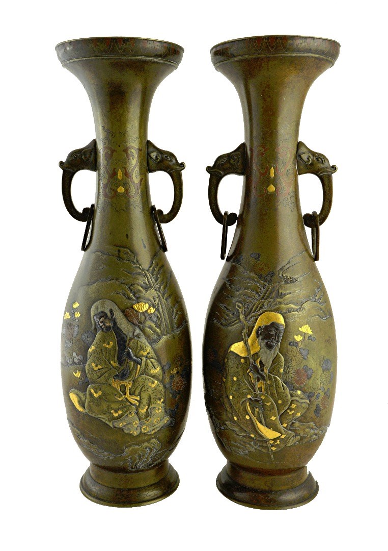 Appraisal: A pair of Japanese bronze two-handled vases Meiji period of