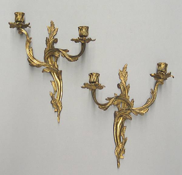 Appraisal: A pair of Louis XV style gilt bronze two-light bras