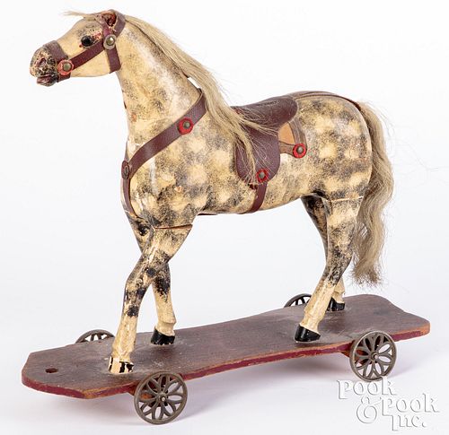 Appraisal: DABBLED PAINTED AND CARVED WOOD PLATFORM HORSEDabbled painted and carved