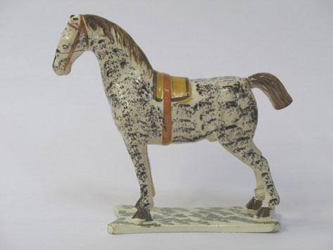 Appraisal: A YORKSHIRE CREAMWARE HORSE early th century the sponged body