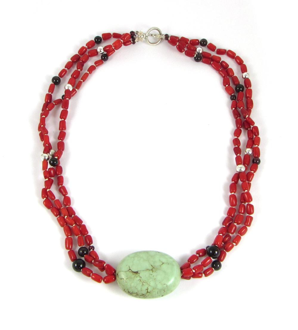 Appraisal: GREEN TURQUOISE CORAL AND GARNET BEAD NECKLACE The triple strand