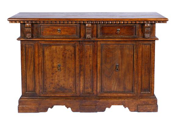 Appraisal: An Italian Baroque style two door credenza height in width