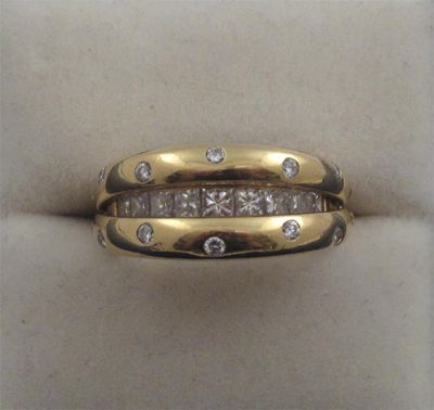 Appraisal: An unusual diamond ring The yellow gold ring is set