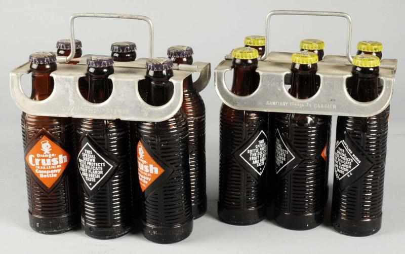 Appraisal: Lot of Orange Crush Carriers Bottle Sets Description s Aluminum