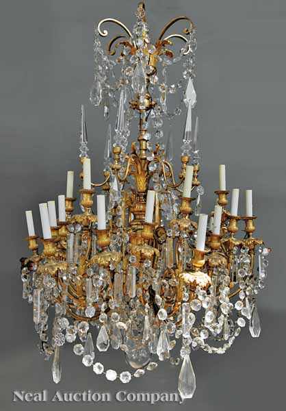 Appraisal: A Louis XVI-Style Baccarat Crystal and Gilt Bronze Twenty-Four Light