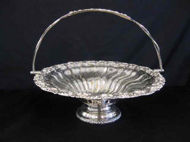 Appraisal: Victorian Silverplate Basket elaborate floral swing handle '' diameter