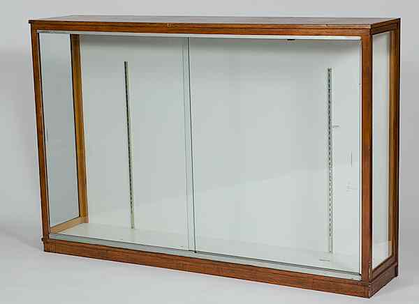 Appraisal: Glass Display Case a wood framed display case with glass