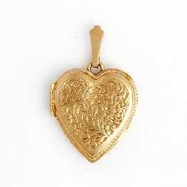 Appraisal: An ct gold heart shaped locket approximately x mm gms