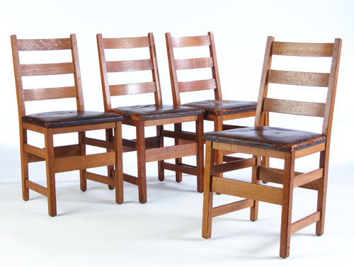 Appraisal: L J G STICKLEY Four ladderback dining chairs with drop-in