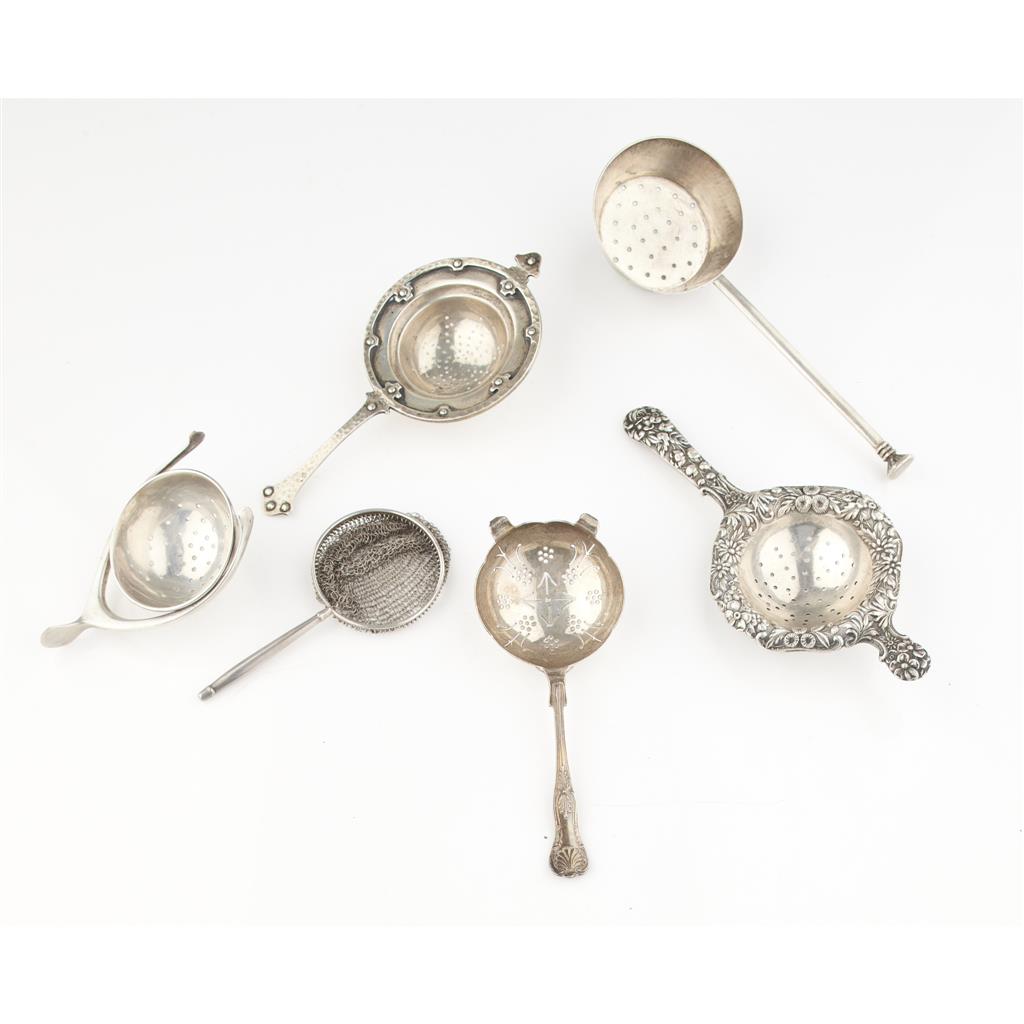 Appraisal: A group of tea strainers Whiting Co a strainer with