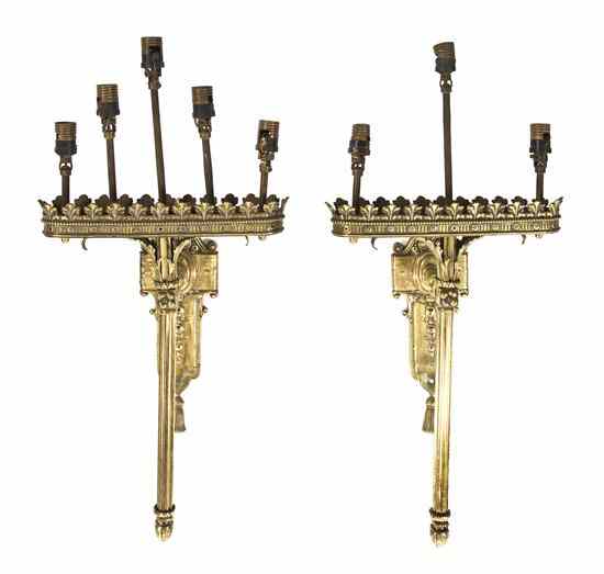 Appraisal: A Pair of Neoclassical Brass Five-Light Sconces having a foliate