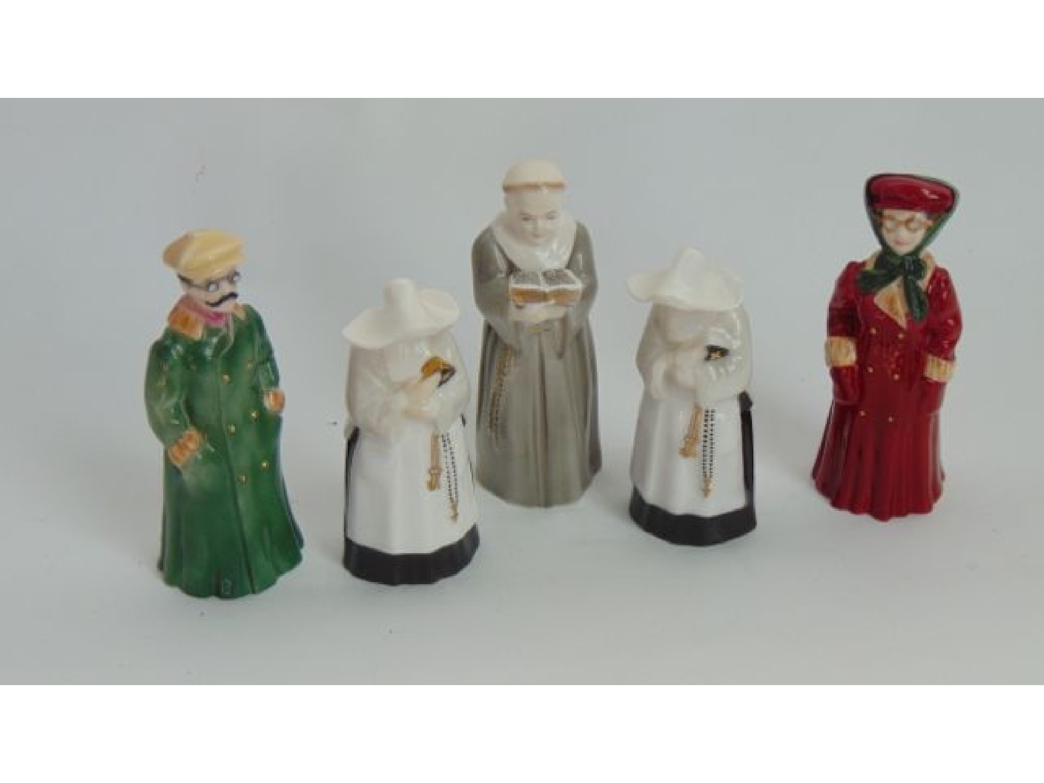 Appraisal: A collection of five Royal Worcester candle snuffers from the