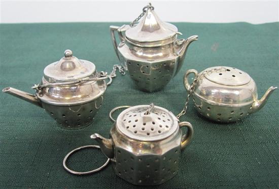 Appraisal: FOUR STERLING SILVER TEAPOT FORM TEA BALLS Approx Troy ozs