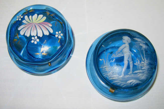 Appraisal: TWO VICTORIAN BLUE GLASS VANITY BOXES Each with hinged enamel