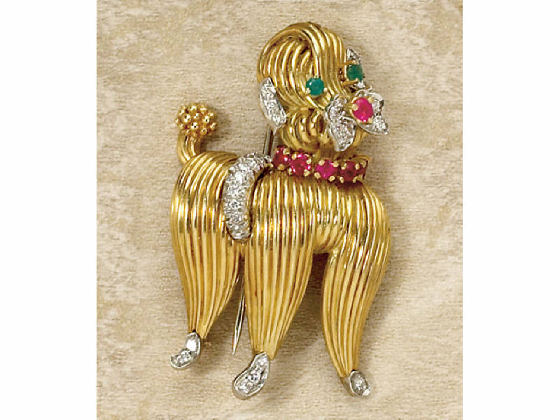 Appraisal: POODLE BROOCH k yellow gold with seven faceted rubies in