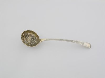 Appraisal: A George III Scottish sugar sifter ladle with later chased