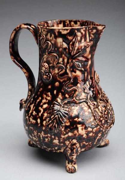 Appraisal: Rare Tortoise Shell Wealden Creamer Very rare and unusual form