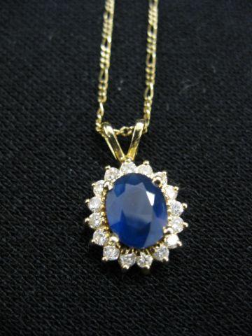 Appraisal: Sapphire Diamond Pendant carat oval gem surrounded by diamonds totaling