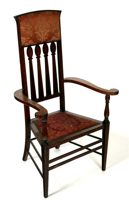 Appraisal: An Art Nouveau inlaid mahogany high back chair the cushioned