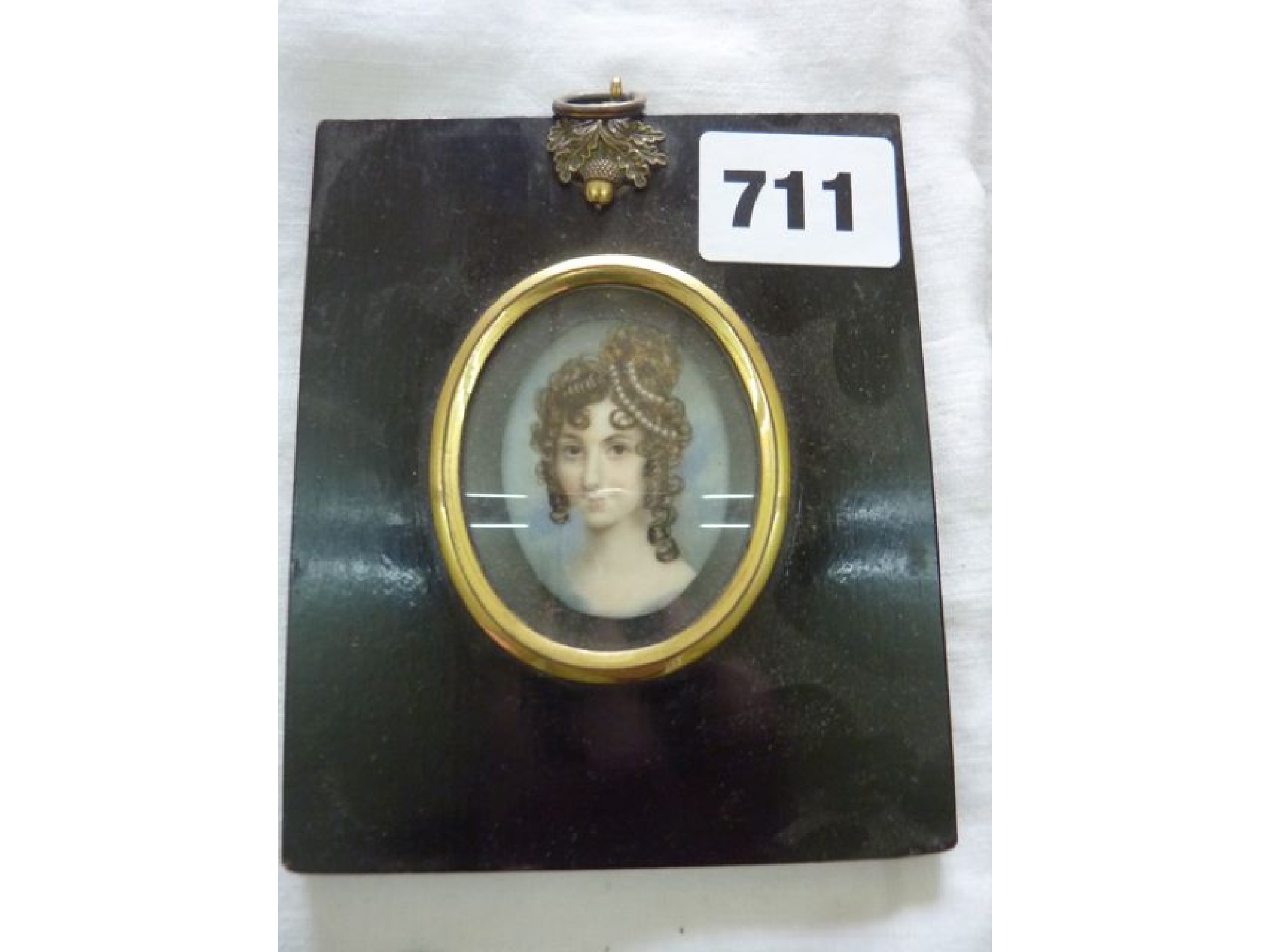 Appraisal: A th century miniature portrait of oval form showing a