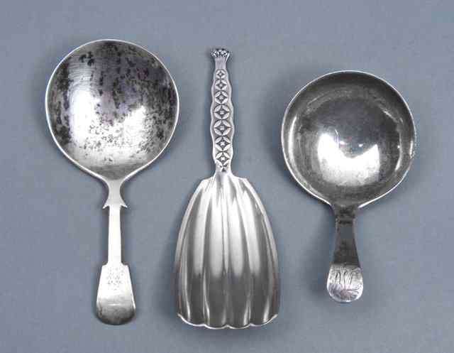 Appraisal: A GEORGE III SILVER CADDY SPOON with a plain bowl