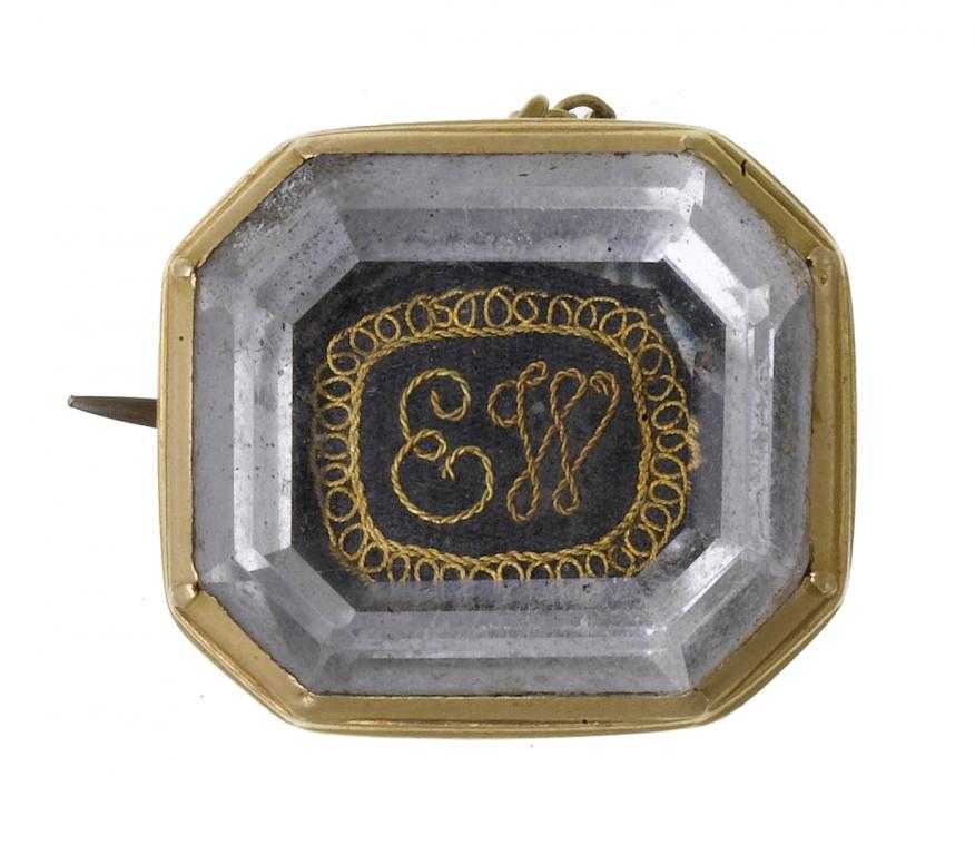 Appraisal: AN ANTIQUE GOLD AND ROCK CRYSTAL LOCKET of octagonal design