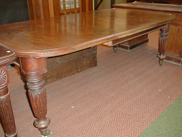 Appraisal: A Victorian mahogany wind-out dining table having the moulded top