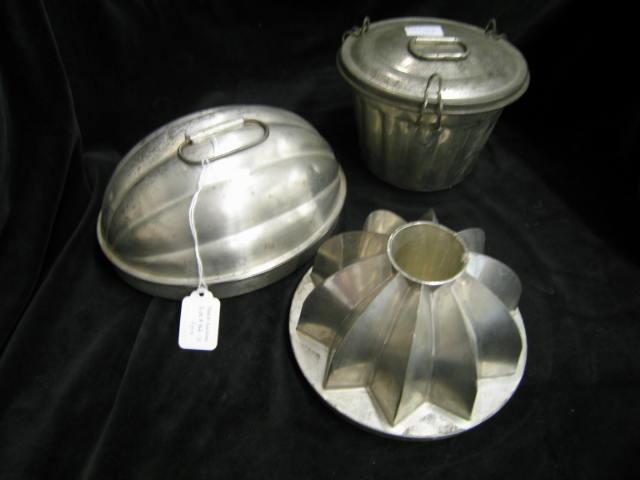 Appraisal: Tin Food Molds to tall