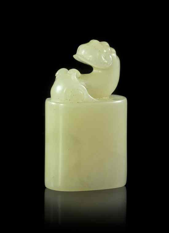 Appraisal: A Carved Soapstone Seal of pale celadon colored stone with