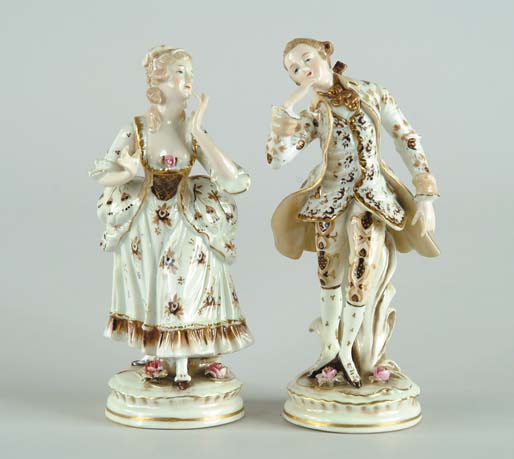 Appraisal: PAIR OF FRENCH STYLE PORCELAIN FIGURINES Man and woman in