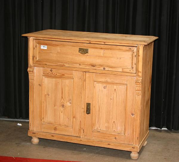 Appraisal: A stripped pine cabinet height in width in depth in