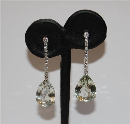 Appraisal: A pair of diamond and pale green quartz pendant earrings