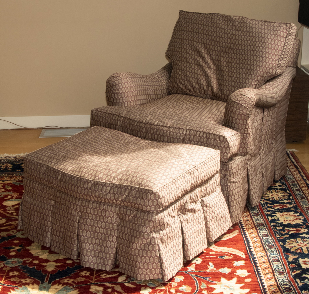 Appraisal: PATTERNED ARMCHAIR WITH OTTOMAN Upholstered arm chair with matching ottoman