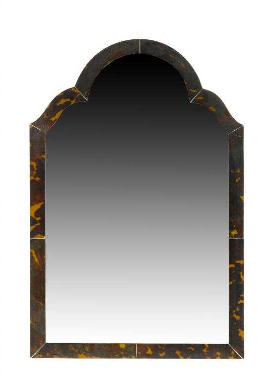 Appraisal: AN ENGLISH TORTOISESHELL DRESSING MIRROR the bevelled plate in arched