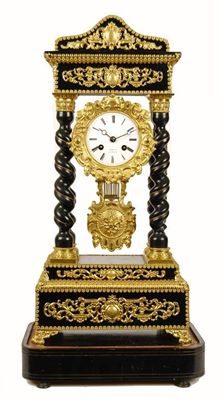 Appraisal: A French ebonised and gilt metal mounted portico clock with