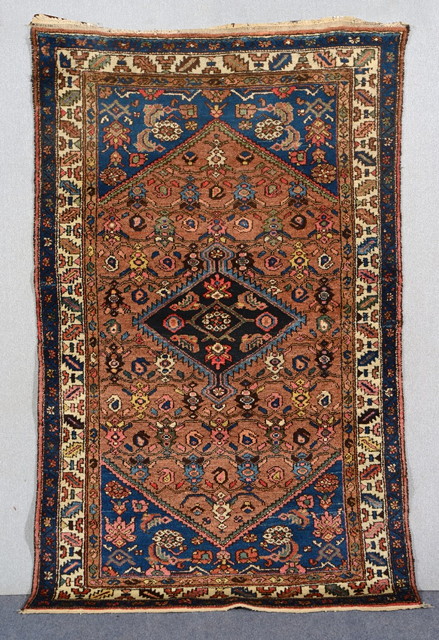 Appraisal: A HAMADAN BROWN GROUND RUG with a central diamond motif