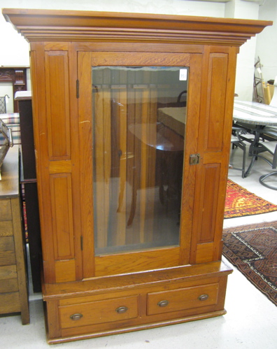 Appraisal: PINE GUN CABINET American early th century having a molded