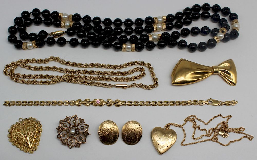 Appraisal: JEWELRY Assorted Gold Jewelry Grouping Includes an onyx and pearl