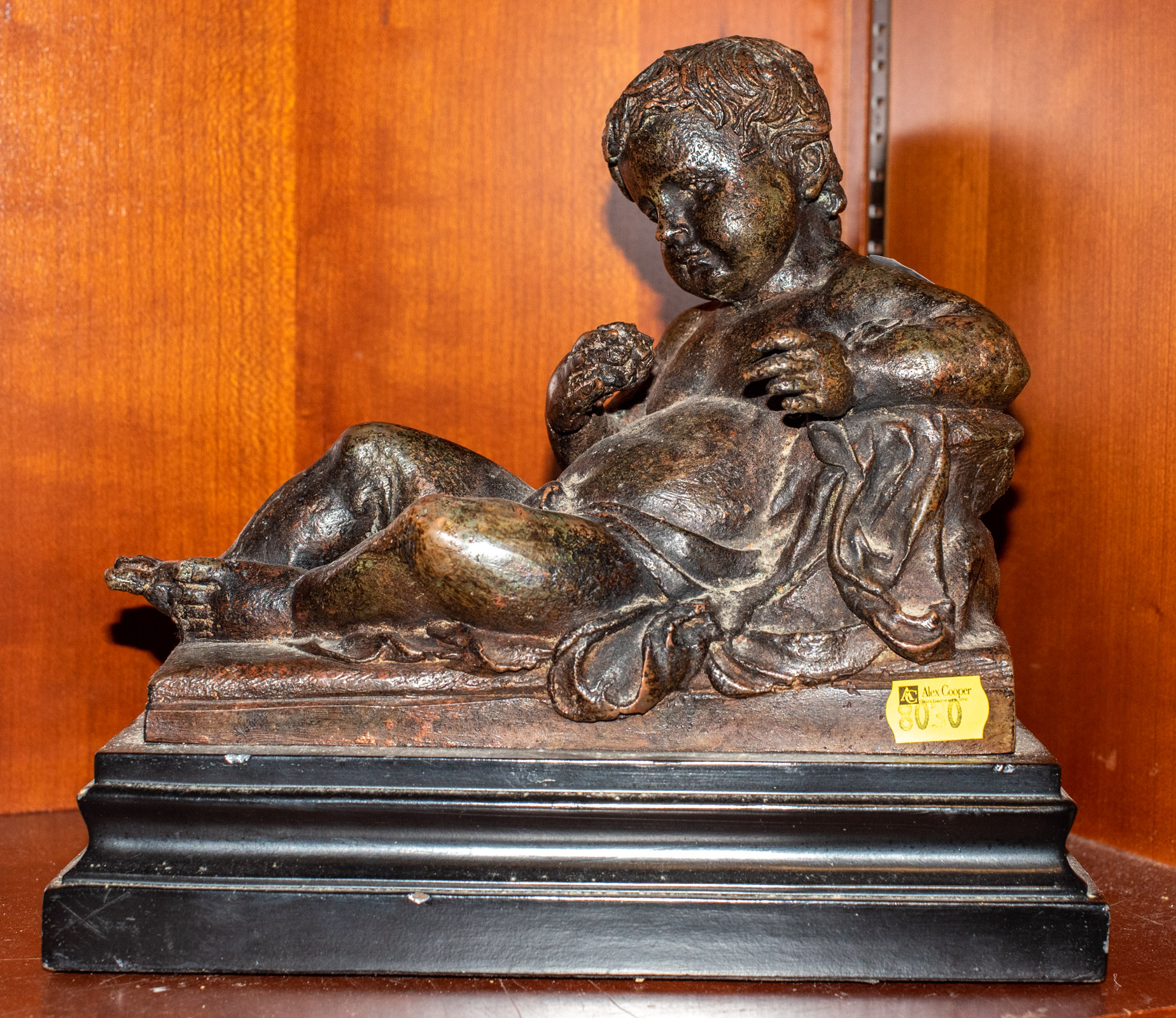 Appraisal: NEOCLASSICAL STYLE PATINATED METAL FIGURE OF A BOY Mid to