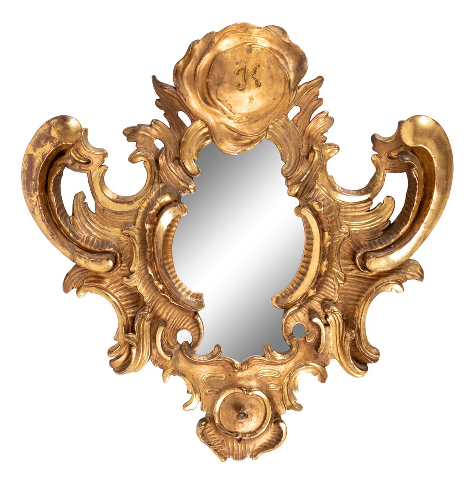 Appraisal: A Continental Carved Giltwood Mirror A Continental Carved Giltwood Mirror