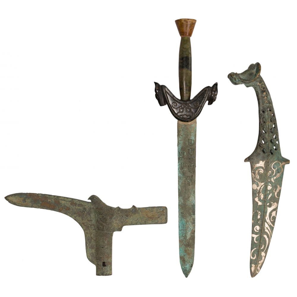 Appraisal: CHINESE BRONZE WEAPON ASSORTMENT archaic style items including a ge