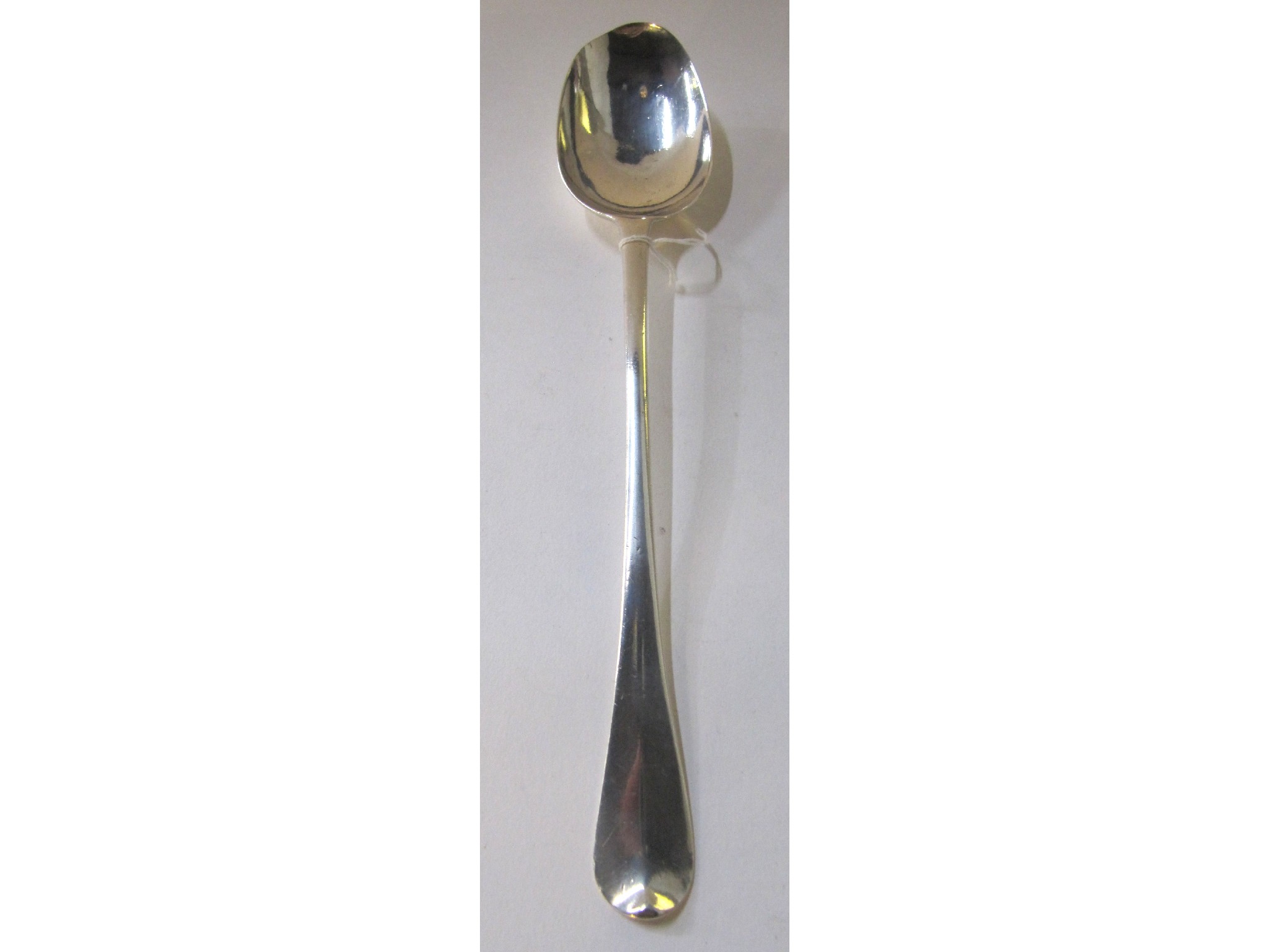 Appraisal: A white metal basting spoon