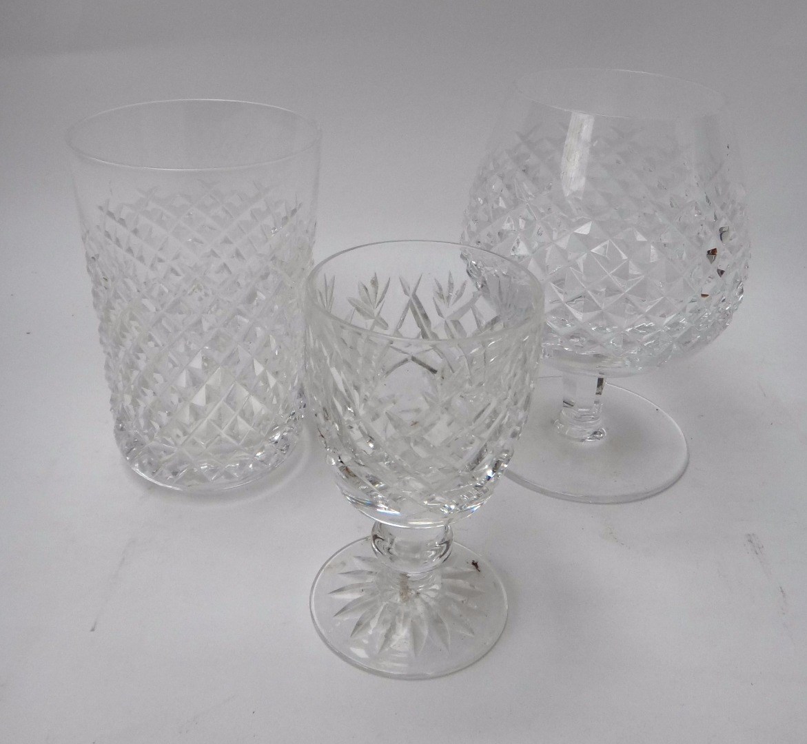 Appraisal: A quantity of Waterford crystal comprising five hobnail cut cognac