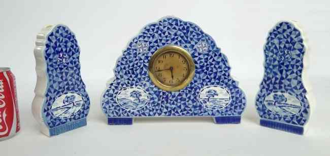 Appraisal: Porcelain Delft type three piece clock set Includes clock ''