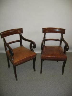 Appraisal: A PAIR OF VICTORIAN MAHOGANY ELBOW CHAIRS with curved top