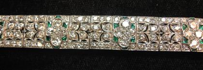 Appraisal: Platinum diamond and emerald Art Deco flexible bracelet th century